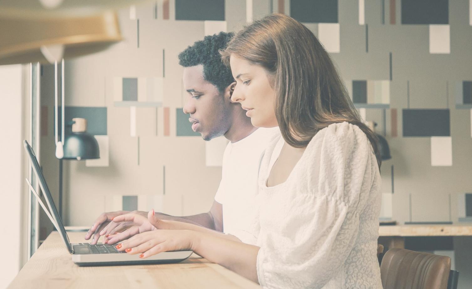 Financial planning consultation session showing documents and charts on desk
